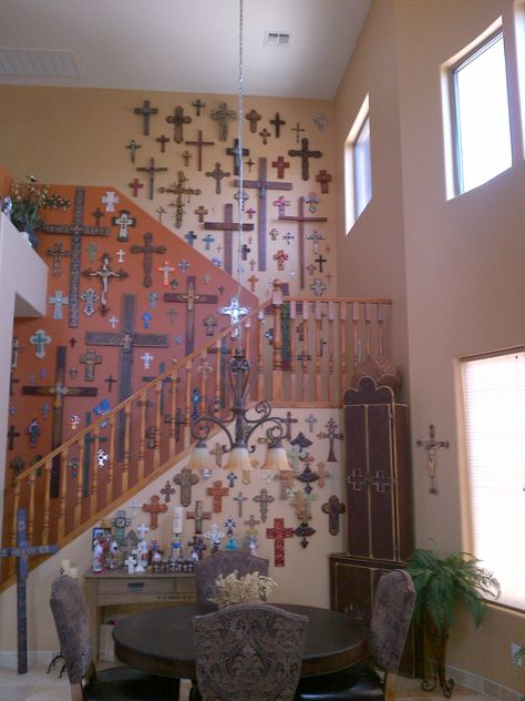 I have always wanted a wall of crosses, but I think this takes it a bit too far. I would begin to feel like Linda Blair. Wall Of Crosses, Hand Painted Crosses, Linda Blair, Catholic Decor, Mexican Wall, Perspective Drawing Architecture, Cross Crafts, Cross Wall, Mexican Home