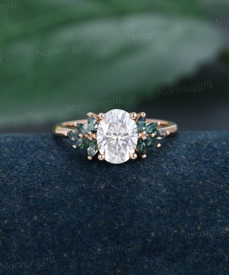 "Oval shaped Moissanite engagement ring Unique rose gold engagement ring Marquise cut Moss agate Cluster ring Bridal dainty Anniversary ring -----Ring Information----- +Center stone: 6*8mm Moissanite +Color: DEF +Clarity: VS-VVS +Cut type: Oval shaped +Side Stone:  Moss Agate Approx weight: 0.4ctw Metal : Solid 14k/18k yellow gold white gold or rose gold, other metal or gemstones, please contact me! Click on the \"Pin It\" icon if you like this item, Thanks so much! Ring Size All rings are stand