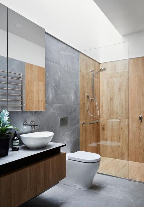 a minimalist bathroom clad with grey stone, with wood in the shower space and a floating wooden vanity Kabinet Dapur, Modern Renovation, Bathroom Design Inspiration, Toilet Design, Bathroom Design Luxury, Wood Bathroom, Grey Bathrooms, Bath Tub, Beautiful Bathrooms