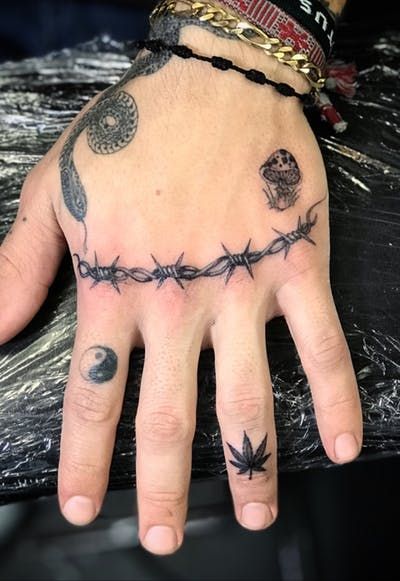 Tattoo uploaded by Big Steve | #handtattoo #barbedwiretattoo #barbedwire #knuckletattoos #finelines | 477330 | Tattoodo Barbed Wire Tattoos, Finger Tats, Knuckle Tattoos, Finger Tattoo Designs, Small Hand Tattoos, Hand Tattoos For Guys, Small Tattoo Designs, Barbed Wire, Tattoo Trends