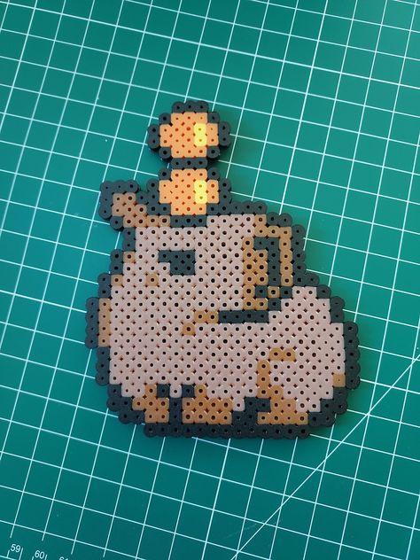 A cute Capybara balancing oranges in bead art form Minecraft Melty Beads Pattern, Perler Bead Beach Patterns, Melted Bead Art, Red Perler Bead Patterns, Capybara Perler Beads, Perler Art Pattern, Snake Perler Bead Patterns, Iron Bead Art, Cute Pixel Art Pattern