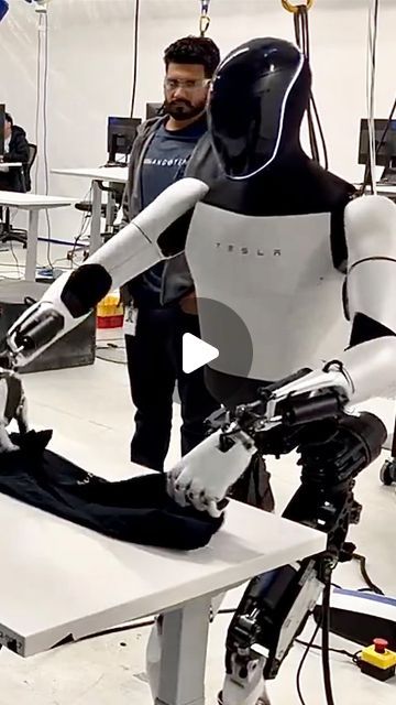 Tesla Go Mars on Instagram: "Tesla Optimus folds a shirt. ℹ️ Teslabot is not yet performing this action on its own. The robot is being operated by a human (like a remote control car) The goal is to perform increasingly complex tasks through teleoperation that stress test the dexterity of the current hardware, and train the AI to perform these actions autonomously. The crazy thing about AI neural nets, is that they have ability to generalize. After enough training examples, they start to develop “a mind of their own.” that means you can train Teslabot to fold a shirt or sort colored blocks, and eventually it will start to understand “ohh, this is how to learn stuff.” As the technology progresses, a robot might be able to put together IKEA furniture, or fix a car, with no human interven Optimus Robot Tesla, Tesla Optimus, The Robot, A Robot, Remote Control Cars, Ikea Furniture, The Crazy, Robotics, The Goal