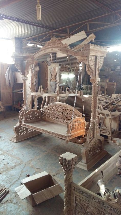 Jhula in wooden material Wooden Jhula, Room Swing, Carved Wood Wall Art, Wooden Swing, Furniture Design Wooden, Wooden Door Design, Wooden Swings, Interior Design Companies, Wooden Bed