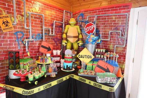 Check out the dessert table at this TMNT birthday party! See more party ideas and share yours  at CatchMyParty.com  #catchmyparty #partyideas  #teenagemutantninjaturtle  #teenagemutantninjaturtlepartydecor  #tmntpartydecor #teenagemutantninjaturtlebirthdayparty  #tmntbirthdayparty  #boybirthdayparty Tmnt Halloween, Tmnt Birthday Party Ideas, Dessert Tables Ideas, Tmnt Birthday Party, Tmnt Toys, Ninja Turtle Birthday Party, Turtle Birthday Party, Mutant Ninja Turtles Party, Turtle Birthday Parties