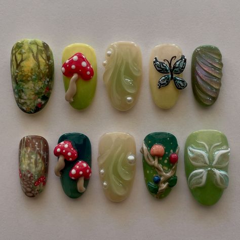 enchanted forest custom set 🍄🌳✨ vine nail ib @setsxnenita mushrooms ib @innerbloom.nails . . . #pressonnails #pressonnailbusiness #nailart #naildesign #3dnailart #handpaintednailart #enchantedforest #forestnails #naturenails #mushroomnails #butterflynails Nail Ideas Mushroom, Green Nails With Charms, Toadstool Nails, Nail Inspo With Charms, Trippy Mushroom Nails, Mushroom Nails Art, Innerbloom Nails, Forest Nail Art, Enchanted Forest Nails