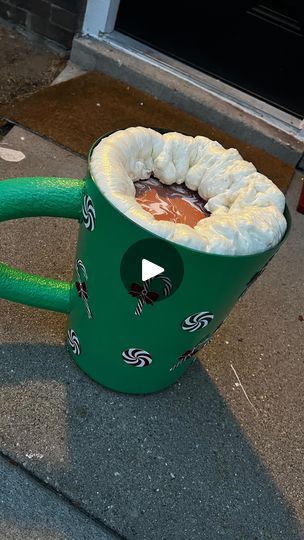 48K views · 59K reactions | Oversized hot chocolate cup inspired by @shellychicboutique 

This was fun to make 
@Walmart for the trash can 
@loweshomeimprovement for the pool noodle and gap and crack filler 

#creatorsearchinsights #diy #christmas | Nicole Jay Hot Chocolate Porch Decoration, Hot Chocolate Decor, 2025 Crafts, Hot Chocolate Cup, Christmas Contests, Chocolate Diy, Starbucks Coffee Cup, Christmas Party Themes, Christmas Hot Chocolate