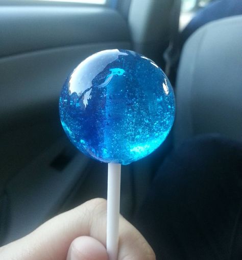 {This lollipop reminds me of space. Oh Original Gourmet your lollipops always taste the best;;} So I was at a gas station with my grandparents there was this woman who was digging through the trash and eating/drinking the food from it. She started yelling at the air and cursing talking to herself etc. And then she walked up to our car and started yelling loudly. That shook me a bit gyahh;; #deerfurslollipoptography by deerfur Blue Lollipop Aesthetic, Blue Candy Aesthetic, Aesthetic Blue Food, Lolipop Art, Candy Core, Blue Lollipop, Pretty Candy, Blue Stuff, All The Bright Places