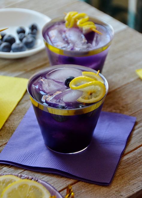 LSU Spiked Blueberry Lemonade - Always Order Dessert Purple Spiked Punch, Purple And Gold Cocktail, Tailgate Party Food Ideas, Lsu Football Party, Blueberry Lemonade Cocktail, College Football Party, Playoff Party, Tailgate Party Food, Peanut Butter Buckeyes