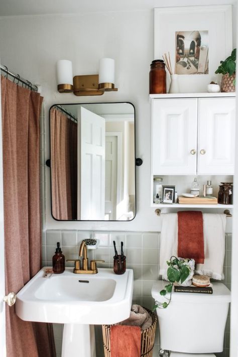 Decorating Tricks to Maximize a Tiny Apartment Small Bathroom Retro Style, Mcm Apartment Bathroom, Colorful Tiny Bathroom, Bathroom Inspiration Rental, Cottagecore Bathroom Apartment, Small Bathroom Vintage Ideas, Bathroom Decor Ideas Modern Trendy, Small Renter Bathroom Ideas, Small Bathroom Rental Ideas