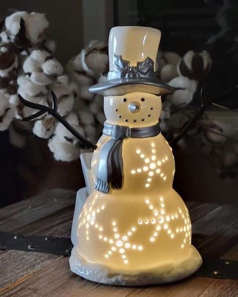 Sparkling Snowman Scentsy Warmer | With his silver snow gear and delicate snowflakes that emit a warm glow when lit, this sparkling snowman makes the jolliest addition to your holiday display.