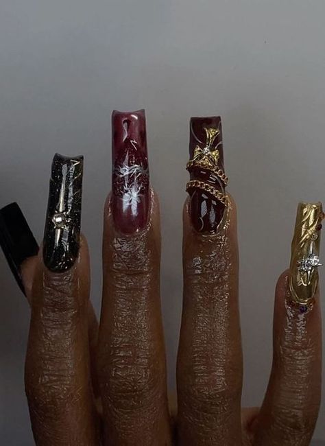 Baddie Nails Extra: Long acrylic nails in black, gold, nude, and red. Black Nails Red Bottoms, Red Gothic Nails, Red Black And Gold Nails, Extra Baddie Nails, Extra Long Acrylic Nails, Nails In Black, Extra Nails, Gold Acrylic Nails, Nails Extra