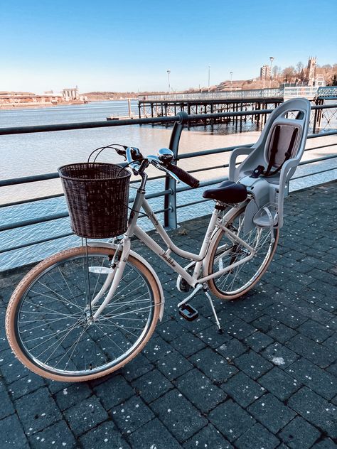 A Pendleton bike with a wicker basket on the front and a child seat attached to the back, parked in front of river and pier. Pendleton Bike, Child Bike Seat, Kids Seating, Bike Seat, Kids Bike, Pretty Pictures, Bicycle, Bike