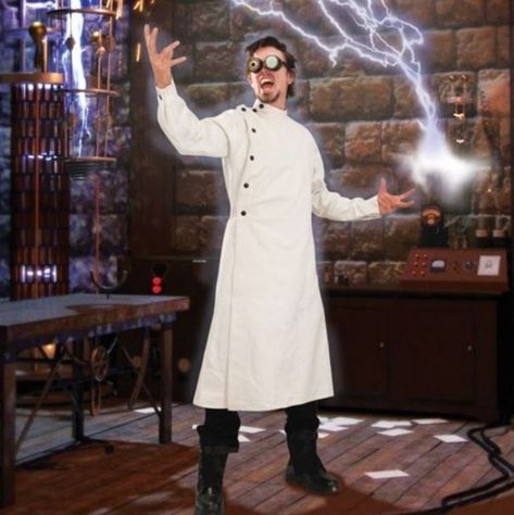 LET YOUR INNER MAD SCIENTIST OUT TO PLAY IN THIS AWESOME STEAMPUNK MAD SCIENTIST VICTORIAN LAB COAT! This lab coat was high-fashion for the mad scientists in Victorian times!  The steampunk elements are in the large black snaps running along the neck, shoulders, wrists and down the asymmetrical front panel.  Made of heavy white denim, this long-sleeved, full-length overcoat is durable as a lab coat should be expected.  The adjustable belt and buckle at the rear provide a comfortable fit. Mad Scientist Lab Coat, Mad Scientist Outfit, Steampunk Frankenstein, Scientist Lab Coat, Scientist Outfit, Lab Coat Costume, Film Writing, Mad Scientist Costume, Dr Horrible