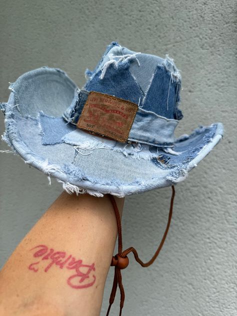 Reworked Levi denim cowboy hat  Hand  made great for summer parties 🎉 🍒🪩🤠 Great for standing out  Great for looking 👀 good  Pool party 🎉  This is one size ! The Head circumference inside the hat is 23"  The hat in the picture is sold but I make every hat I sell so I make as close to the picture as poss unless you would like it looking different please message and ask me if you not sure 💕💕 All items are handmade by myself I make the hat once ordered unless I have any already made to send Stetson Cowboy Hats, Cowboy Hut, Denim Cowboy, Chain Skirt, Jean Hat, Upcycle Clothes Diy, Diy Baby Clothes, Felt Cowboy Hats, Denim Decor