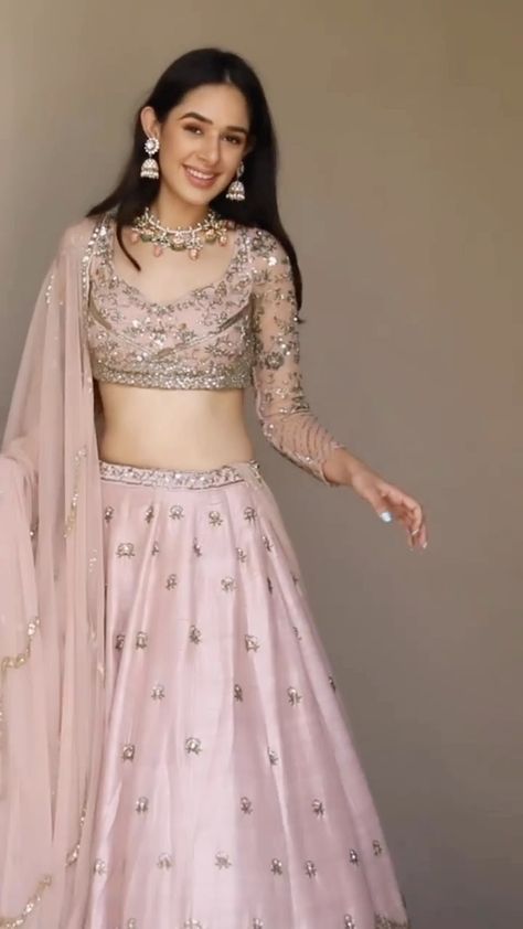 WeddingBazaar Fashion | Engagement or Sangeet - when would you wear this gorgeous pink lehenga 💕 . . Outfit @asthanarangofficial . . .✨ 𝐏.𝐒. 𝐖𝐞 𝐝𝐨𝐧’𝐭 𝐒𝐞𝐥𝐥… | Instagram Sangeet Lehenga Designs For Bride, One Sleeve Lehenga, Bridesmaid Lehenga Look, Blouse Design For Lehenga Wedding, Lightweight Lehenga Designs, Sequins Embroidery Lehenga, Party Wear Lehenga Blouse Designs, Latest Lehenga Blouse Designs Wedding, Lehenga Design Latest