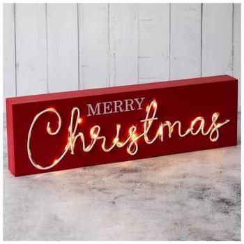 Dimensions: 4.75" H x 15.75" W x 1.63" D Power Source: 2 AAA Batteries (Not Included) Material: MDF & Metal Shape: Rectangle Color: Red & White Orientation: Horizontal Quantity: 1 Brighten up any holiday display with this Light Up Merry Christmas Wood Decor. This rectangular MDF piece is red with the phrase "Merry Christmas" on the front in festive white font. The word "Christmas" is constructed out of metal and has bright white lights behind the letters. Set this on the mantel with a lush cedar garland for the perfect Christmas arrangement! Christmas Wood Decor, Snowy Town, Cedar Garland, Light Up Canvas, Christmas Fonts Free, Hobby Lobby Christmas, Wall Decor Hobby Lobby, Business Fonts, Christmas Landscape