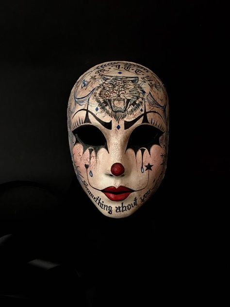 Is it a clown? Is it a mime ? I don’t know... What I do know is that there’s something about her just like her tattoo said, and it will be something about you when you will wear her! ❤️🖤 Hand made paper mache mask, painted with acrylic colors and special finishes. It suits most adult faces and gets Halloween Masks For Women, Tattoo Mask, Mask Project, Costume Department, Jester Mask, Creepy Masks, Paper Mache Mask, Mascaras Halloween, Mask Aesthetic