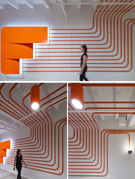 Studio BV have designed the Field Nation offices that were inspired by a circuit board and features orange conduit piping throughout, guiding people to the various areas of the office. #InteriorDesign #OfficeDesign #DesignAccent Orange And Blue Office, Funky Office Design, Pipes Design, Gray Interior Doors, Circuit Board Design, Industrial Office Design, Office Branding, Web Banner Design, Environmental Design