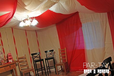 How to make a circus tent with dollar store tablecloths! Plus tons of circus party ideas and free printables. Diy Circus Tent, Circus Party Ideas, Carnival Themed Birthday Party, Carnival Birthday Party Theme, Diy Tent, Circus Theme Party, Tent Fabric, Solar Deck Lights, Circus Tent