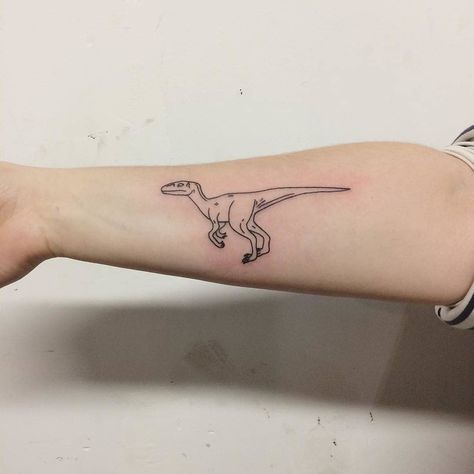 Lovely outline little dinosaur tattoo on the right forearm Small Tattoos Dinosaur, Jurassic Park Tattoo, T Rex Tattoo, Dinosaur Tattoo, Dinosaur Tattoos, Tattoo Convention, Tattoo For Son, Top Tattoos, Home Tattoo