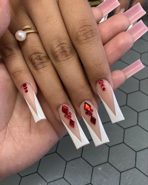 Red And White Nails Prom, Red And White Nails With Rhinestones, Nail Ideas Red Bottoms, Nails Red Gems, White French Tip Nails With Red Gems, French Nails With Diamonds Rhinestones, Red Nails Acrylic Gems, Red Nail Gem Designs, Nails With Red Gems