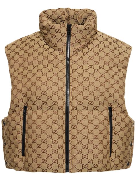 Find Gucci Gg Canvas Down Vest on Editorialist. High collar with concealed hood. Front zip closure. Logo details. Sleeveless. Two side zip pockets. Padded . Lined. Model is wearing a sizeS Shoe Storage Hacks, Canvas Vest, Shoe Storage Solutions, Versace Brand, Ski Accessories, Outerwear Vest, Jackson Hole, Down Vest, Swim Accessories