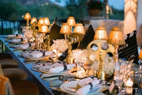 Hollywood theme table decor. Gold lamps and movie reels Glam Table Setting, Oscars Theme Party, Oscars Party Ideas, Oscar Viewing Party, Glam Table, Hollywood Party Theme, Glamour Party, Gala Ideas, Oscar Night