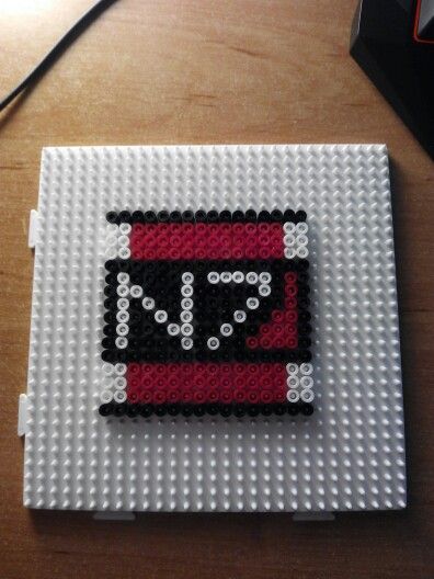 Mass Effect N7 badge Mass Effect N7, Bead Ideas, Mass Effect, Perler Bead, Perler Beads, Pixel Art, Beads, Art