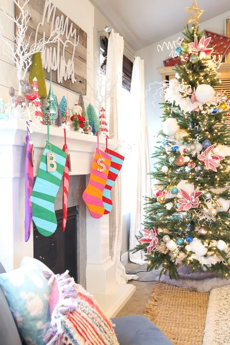 Colorful Christmas Stockings Ideas, Colorful Stockings Christmas, Merry And Bright Outdoor Christmas Decor, Christmas Decor Bright Colors, Bright And Merry Christmas Decor, Townhouse Christmas, Merry And Bright Christmas Stocking, Bright Christmas Decorations, Garlands Christmas