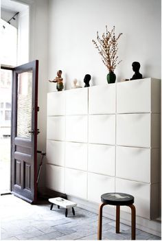 Storage can be more than functional.  A wall of TRONES shoe cabinets looks modern and sculptural in this entryway from blogger Henriette Wleth. Ikea Shoe Storage, Ikea Trones, Vstupná Hala, Ikea Shoe, Ikea Storage, Shoe Storage Cabinet, White Cabinets, Design Case, Ikea Hack