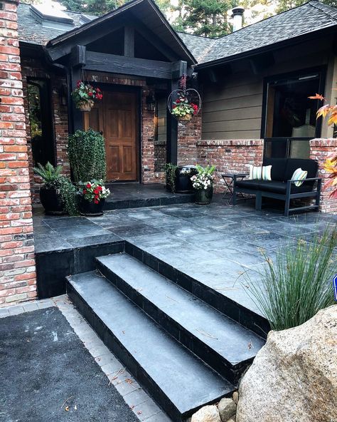 Before and after of the cracked front porch. Replaced with this stunning 2 inch thick black basalt natural stone. Front Porch Stone, Concrete Front Porch, Outside Tiles, Paint Concrete Patio, Patio Stairs, Stone Porches, Concrete Patio Makeover, Front Stairs, Brighton Houses