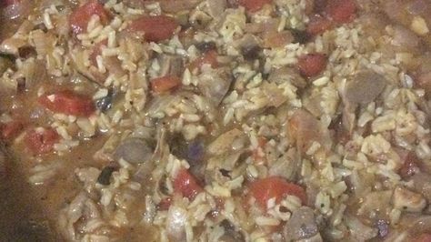 This flavorful dish of seasoned rice and Chicken gizzards make low fat protein a joy.  A simple recipe for savory satisfaction. Gizzards And Rice, Gizzard Stew Recipe, Offal Recipes, Gizzards Recipe, Rice And Chicken, Low Fat Protein, Chicken Gizzards, Seasoned Rice Recipes, Liver And Onions