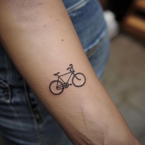 Embrace the freedom and journey of life with this minimalist road bike tattoo, a symbol of adventure and passion. Let the sleek lines inspire you to pedal towards your dreams. Save & follow for more ink inspirations. 🚴‍♂️✨ #TattooArt #MinimalistInk #CyclingLove #AdventureTattoo #InkInspiration #Aiimage Road Bike Tattoo, Bike Tattoo, Adventure Tattoo, Bicycle Tattoo, Tattoo On Forearm, Bike Tattoos, Riding Bike, Journey Of Life, Forearm Tattoos