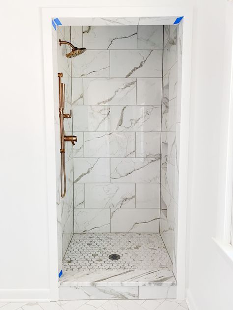 Marble Look Tile Shower Walls, Marbled Porcelain Tile Bathroom, Contessa Oro Tile Bathroom, Master Shower Marble Tile, Faux Marble Tile Bathroom, Porcelain Marble Tile Bathroom, Faux Marble Porcelain Tile Bathroom, Marble Walk In Shower Ideas, Porcelain Tile Shower Walls