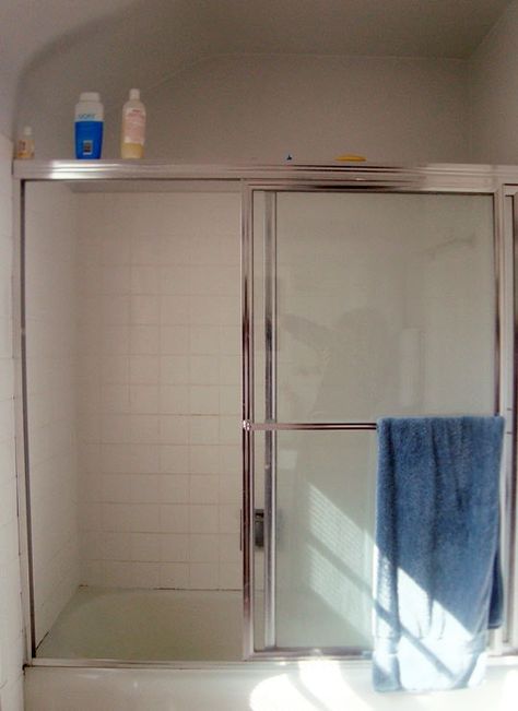 I've long wanted to replace our bulky old shower doors with a curtain in our home's one-and-only family bathroom Replace Shower Door, Makeover Kamar Mandi, Bathroom Shower Doors, Tub Doors, Diy Shower, Bathroom Tub, Sliding Shower Door, Bathroom Redo, Trendy Bathroom