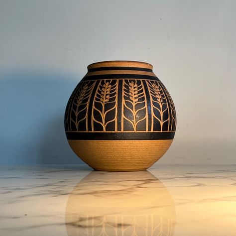 * beautifully handcrafted round pottery vase * with carved and glazed plant motif * signed "Brown" on bottom * in great vintage condition * tiny flea bite to rim * 6-1/2" d at widest point by 6-1/2" tall Earthenware Pottery Ideas, Carved Ceramic Vase, Carving Pottery, Cool Pottery Ideas, Pottery Carving Ideas, Earthenware Pottery, Clay Vase, Decorative Pots, Pottery Techniques