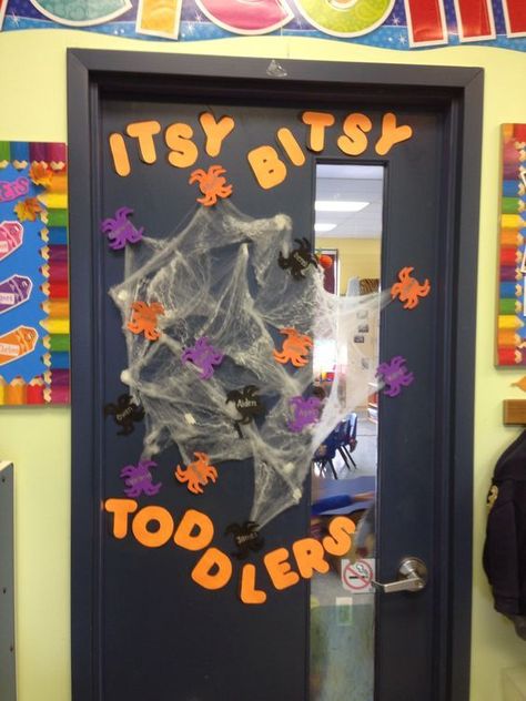 Halloween Door Decoration Ideas for your Classroom or Dorm Room - Hike n Dip Halloween Display Boards Nursery, Halloween Door Decorations Classroom Spider, Halloween Decorations Nursery School, Halloween Classroom Hallway Decorations, Itsy Bitsy Spider Bulletin Board Ideas, October Birthday Board Classroom, Spider Classroom Decoration, Halloween Display Board, Halloween School Board Ideas