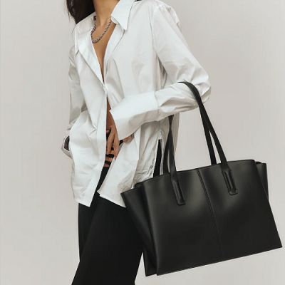 This laptop tote looks like a winner, especially if you carry a 16" laptop. The post Coffee Break: Paloma Laptop Tote appeared first on Corporette.com. Laptop Tote, Black Luxury, Vegan Leather Bag, Work Bag, Work Bags, Black Tote, Leather Zipper, Perfect Bag, Coffee Break