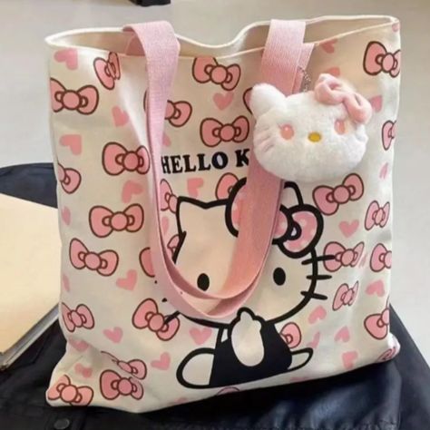 Sanrio Hello Kitty Canvas (Beige With Pink Handles) Medium Tote Shoulder Bag Zip Top Closure Plus Hello Kitty Bag Charm Approx. Dimensions: 33cm X 32.6cm 12.99" X 12.83" ++++++++++++++++ This Item Will Be Shipped From A Smoke-Free Environment. For Further Insight, Kindly Consult The Accompanying Photographs, As Color Variations May Occur Due To Lighting Or Display Settings. Your Purchase Signifies Your Acknowledgment Of Thoroughly Examining All Provided Images And Reading Through The Listing. If Hello Kitty Canvas, Sanrio Bag, Sanrio Pink, Hello Kitty Bag, Hello Kitty Items, Cat Charm, Medium Tote, Pink Bow, Zip Top