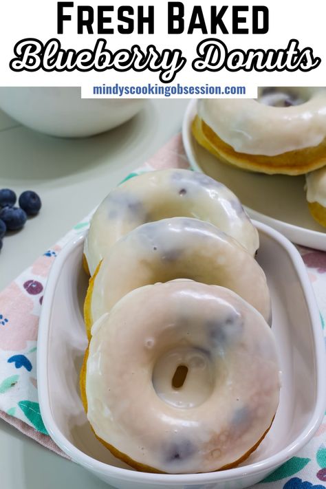 Our Homemade Blueberry Donuts are soft and loaded with lots of fresh blueberries. They are baked, not fried and made with simple ingredients. No yeast, no rolling out doughnut dough, no trying to keep oil the right temperature. Just mix the batter, fill the pan, and bake! We make our homemade donuts in a doughnut pan, but don't worry if you don't have one because they can also be made in a muffin tin. via @mindyscookingobsession Blueberry Donuts Baked, Blueberry Doughnuts, Easy Breakfast Treats, Blueberry Cake Donuts, Lemon Blueberry Cake, Cake Donuts Recipe, Doughnut Recipe Easy, Baked Recipe, Blueberry Donuts