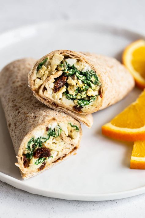 Egg, Spinach and Feta Breakfast Wrap | Eating Bird Food Breakfast Wrap Ideas, Hummus Breakfast, Feta Breakfast, Beef Snacks, Feta Eggs, Healthy Breakfast Wraps, Egg Wraps, Egg Spinach, Starbucks Breakfast