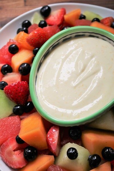 This orange-vanilla dip is made with Greek yogurt and cream cheese, perfect for dipping all your favorite fruits! #fruitdip #recipe #yogurtdip #healthysnacks Vanilla Dip, Greek Yogurt Fruit Dip, Healthy Fruit Dip, Yogurt Fruit Dip, Green Bean Salad Recipes, Orange Yogurt, Fruit Dips Recipes, Fresh Salad Recipes, Bean Salad Recipes