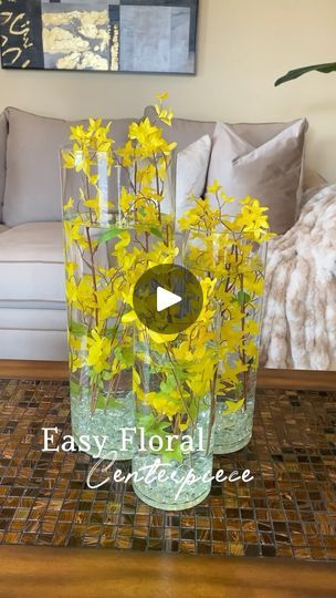 2.3K views · 189 reactions | 💛Simple DIY Floral Centerpiece💛

Let’s bring back the beautiful DIY cylinder centerpieces! 

To recreate you need⬇️
✨Glass Pebbles @dollartree 
✨Florals @michaelsstores 
✨Cylinder Vases @athomestores 

How to create water floral arrangement| Water floral design idea| Flower arrangement| Floral hack| Water floral arrangement DIY| Water floral arrangement idea
.
.
.
.
.
#diy #diyhomedecor #diydecor #diylover #diylove #diyideas #instadecor #homedecor #floralarrangement #centerpiece #centerpieceideas #centerpieces #floral | Alexandra Volcy | Meghan Trainor · To The Moon Cylinder Vase Centerpiece, Cylinder Centerpieces, Diy Floral Centerpieces, Centerpieces Floral, Glass Pebbles, Arrangement Floral, Floral Arrangements Diy, Floral Centerpiece, Diy Water