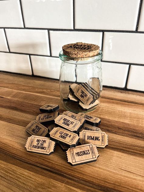 Never struggle to decide what to do for a date night again! Details: Jar is 3.5" tall and 2.5" wide with a cork top Includes 25 date night ideas including one "His Choice" and one "Her Choice" Examples of some of the activities Happy Hour Shoot Pool Watch the Sunset🌐#LoveStory #RomanticEncounters #HeartfeltConnections #DateNightIdeas #SoulmateSearch #FlirtyFridays #CandlelitDinners #StarryEyedMoments #LoveQuotes #DreamyDates #WhisperedPromises #AmourAdventures Jar Of Dates, Sports Medal Display, Date Jar, Date Night Jar, Date Night Gifts, Kids Growth Chart, Christmas Stocking Ornament, Teacher Gift Card, Tiered Tray Diy