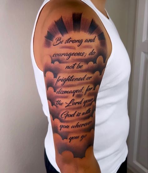 Sleeve Tattoo With Quote, Arm Tattoo Men Upper, Biblical Shoulder Tattoos For Men, Shoulder Quote Tattoo Men, Scripture Tattoos For Men Shoulder, Christian Bicep Tattoo Men, Positive Arm Tattoo Men, Bible Verse Shoulder Tattoos, Bicep Tattoo Men Bible Verse