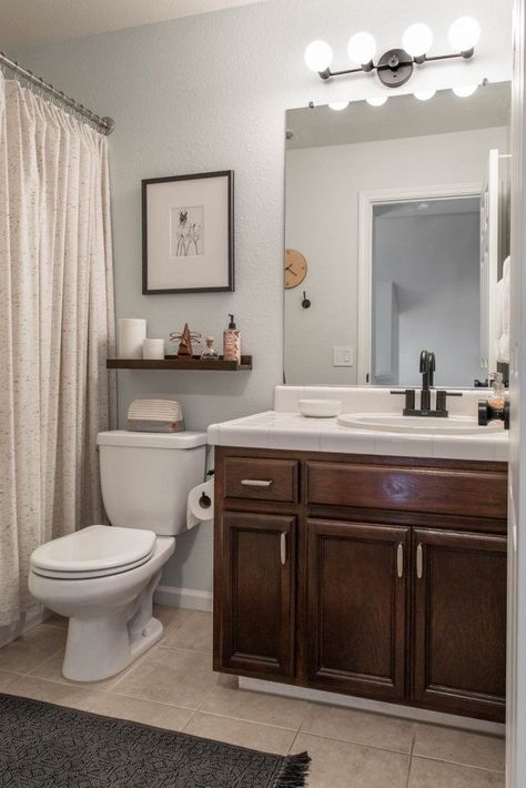 Bathroom With Cherry Wood Cabinets, Guest Bathroom Brown Cabinets, Small Bathroom With Dark Cabinets, Brown Neutral Bathroom, Bathrooms With Dark Brown Cabinets, Small Bathroom Dark Cabinets, Dark Wood Cabinets Bathroom, Bathroom Decor Dark Cabinets, Bathroom Dark Wood Cabinets