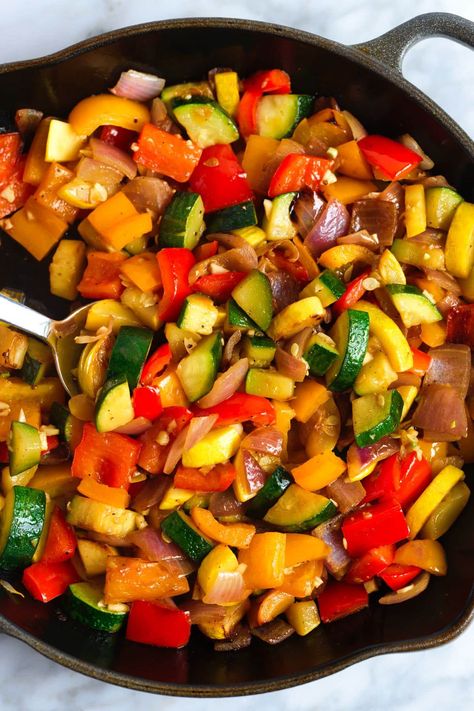 Easy sautéed vegetables recipe! We love this dish with onion, zucchini, bell pepper, and garlic, but you can substitute or add your favorite vegetables. These sautéed veggies are […] Zucchini Mixed Vegetables, Cast Iron Skillet Vegetables, Sauteed Zucchini And Peppers, Balsamic Veggies Sauteed, Cooking Fresh Vegetables, Assorted Vegetable Recipes, Bell Pepper Zucchini Onion, Veggie Melody Recipe, Healthy Sauteed Vegetables