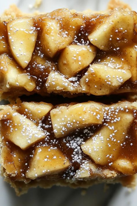 Image of delicious salted caramel apple pie bars, showcasing the crispy crust and gooey caramel topping, perfect for your fall dessert table. Apple Bars With Pie Crust, Caramel Apple Pie Bars, Heavenly Dessert Recipe, Traditional Apple Pie, Salted Caramel Apple Pie, Apple Pie Bars, Classic Apple Pie, Gooey Caramel, Caramel Apple Pie