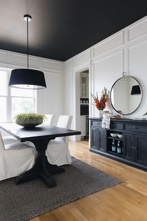 We added drama with a black ceiling Paint color is Black by Benjamin Moore #blackceiling #Paintcolor #BlackbyBenjaminMoore Black Ceiling Paint, Black And White Dining Room, Ceiling Paint Colors, Kitchen Ceiling Design, Modern Farmhouse Home, White Interior Design, Black And White Interior, White Dining Room, Kitchen Ceiling