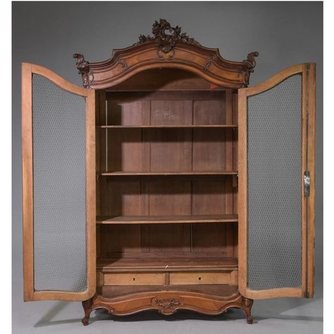 Gorgeous Louis XV style walnut double door shelved cabinet, with brass grill covered doors.  Classic in design this beautiful shelved cabinet is made of walnut, with hand carved accents, and chevron inlaid designs.  Complete with two interior drawers, this elegant cabinet allows for plenty of display and storage possibilities.  This piece is a wonderful additional to any space. Display Cabinet Antique, Reading Cabin, Wooden Cupboard Design, Random Reference, Victorian Cabinet, Antique Display Cabinets, Elegant Cabinet, Dining Hutch, 60s Furniture